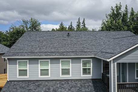 Completed roof replacement on a single-story home in Clark County WA, dark charcoal Malarkey architectural shingles
